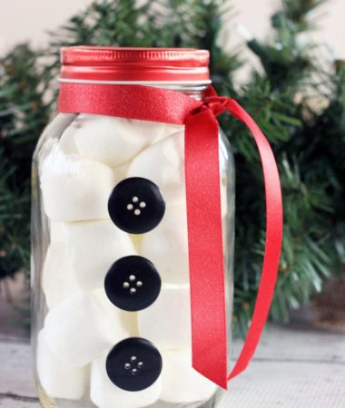 Simple Snowman Mason Jar Craft. Add your favorite treats to complete the snowman.