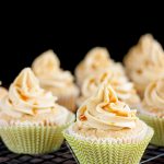Delicious Apple Cupcakes with Caramel Buttercream frosting and a drizzling of caramel.