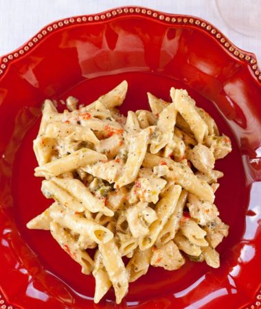 Delicious Cajun Chicken Alfredo that is full of flavor and easily made in the slow cooker!