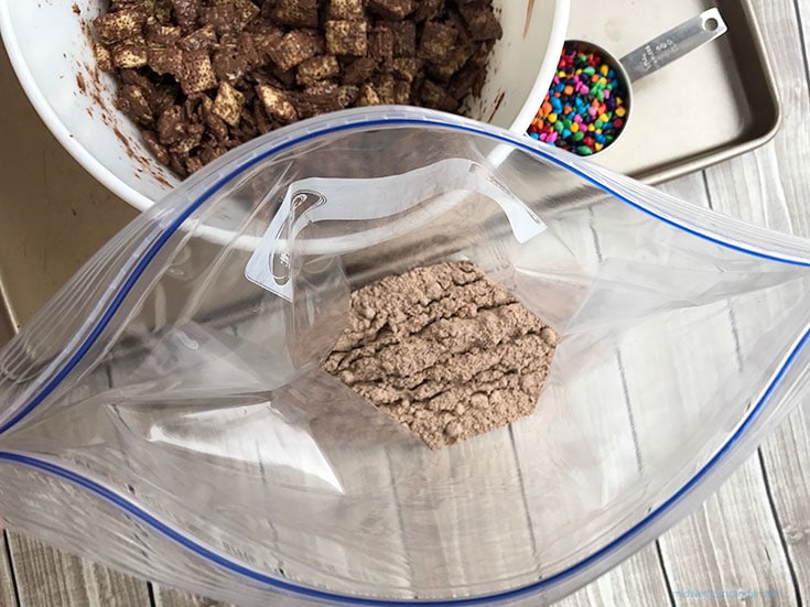 Divide the brownie mix into 2 bags