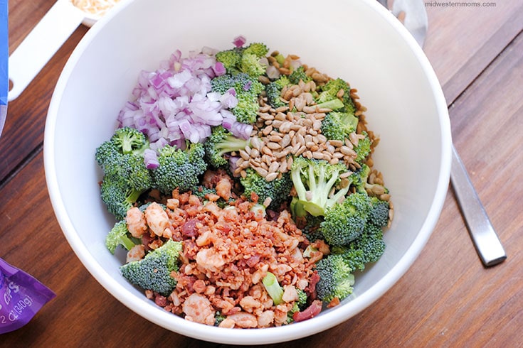 Add Ingredients into a large mixing bowl to start making the broccoli salad