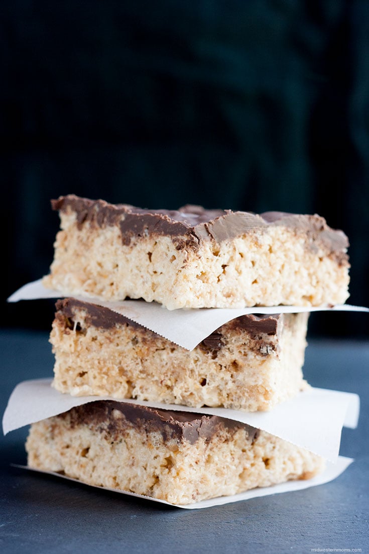 Close up and side view of the stack of three toffee rice krispie treats.