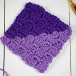 Crocheted square in the corner to corner method