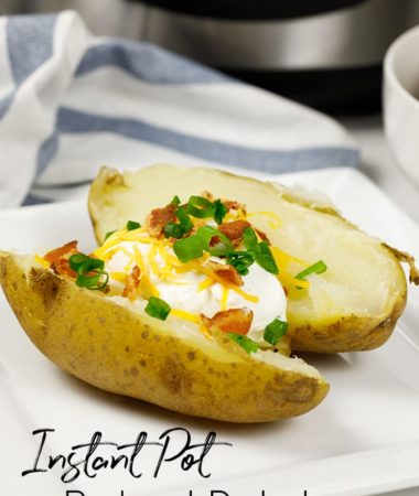 A baked potato with sour cream, cheese, and onions on top. This baked potato was made in an Instant Pot.